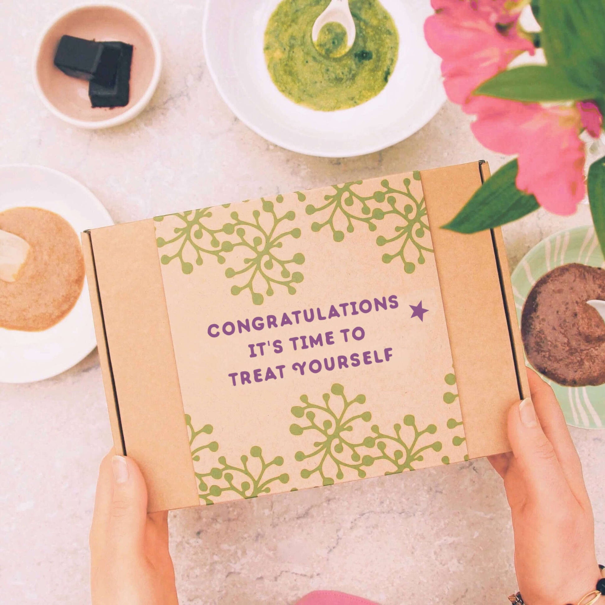 congratulations gift box showing the message "congratulations, it's time to treat yourself"