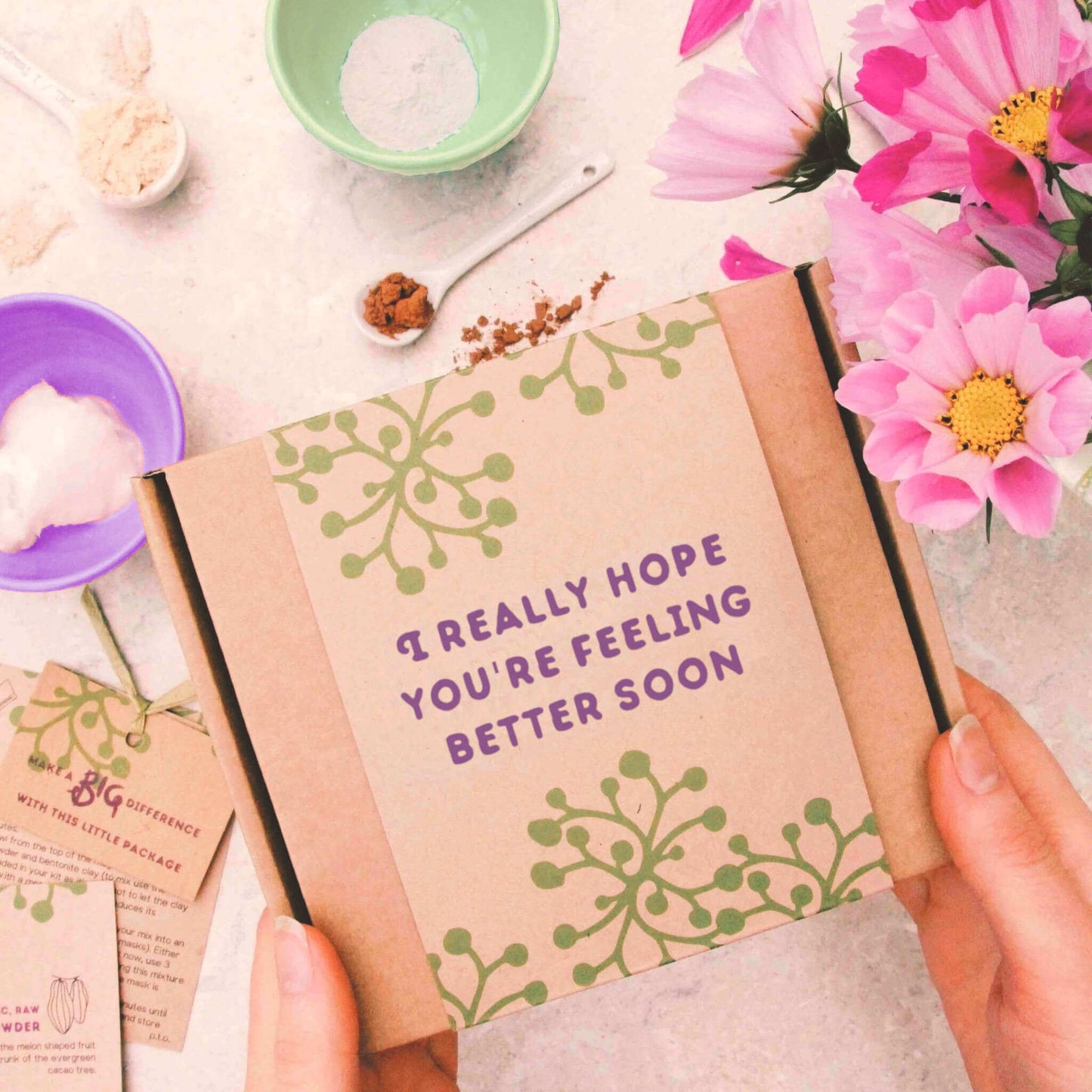 get well soon letterbox gift with gift message 'i really hope you're feeling better soon'