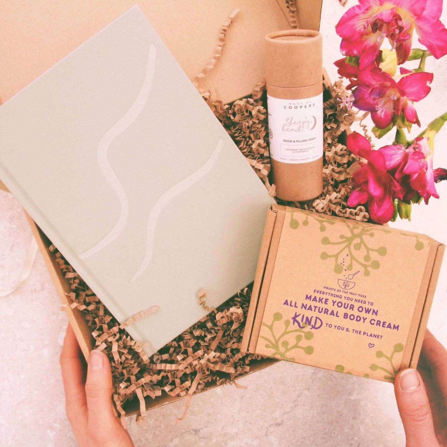 wellbeing gift box with wellness journal, sleep spray and natural skincare